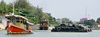 Tugboat Towing Row of Barges, Ayutthaya, Thailand